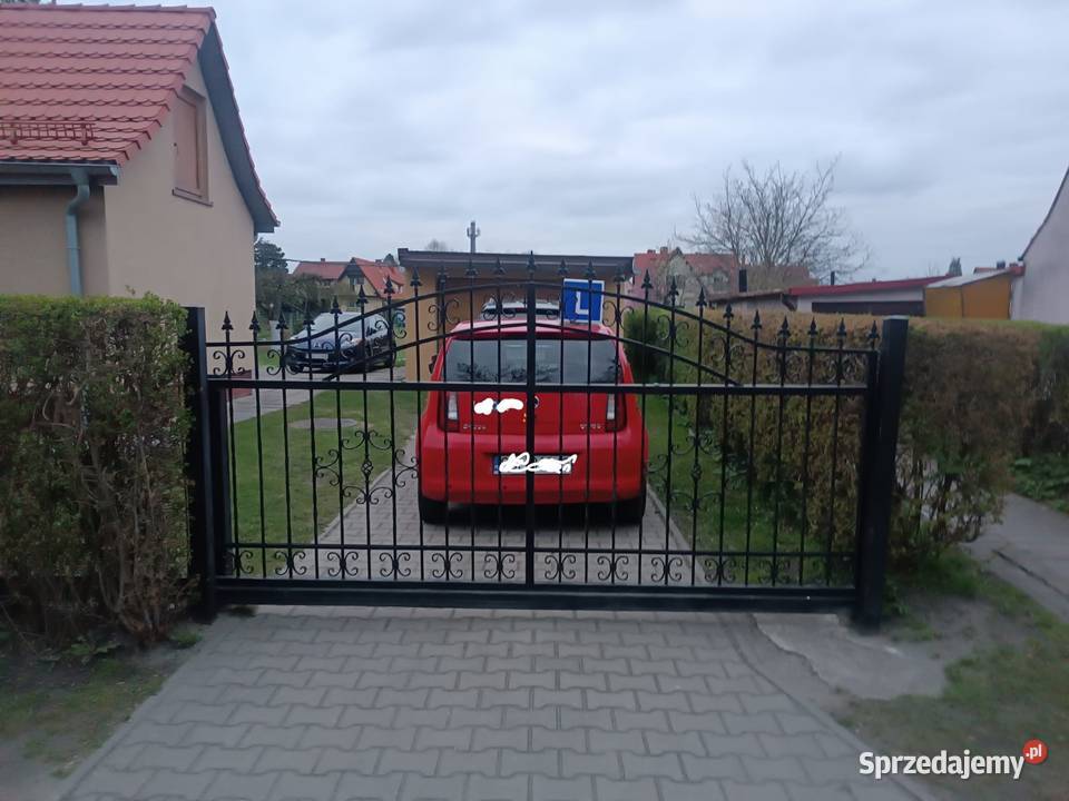 Brama przesuwna kuta ozdobna przesuwna Bramy
