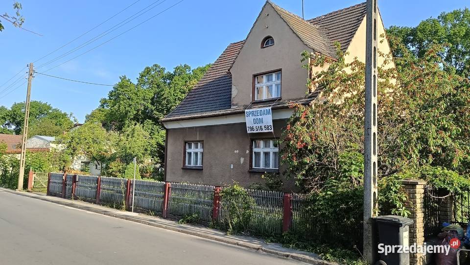 Sprzedam Dom z 2 Mieszkaniami i 2 Garażami sprzedam