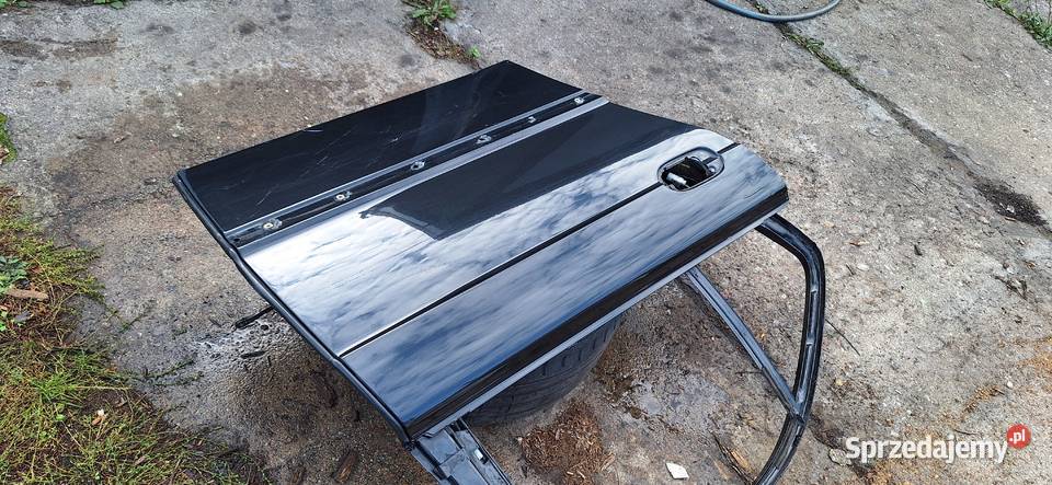 Drzwi BMW E38 prawy tyl Cosmoschwartz Piła