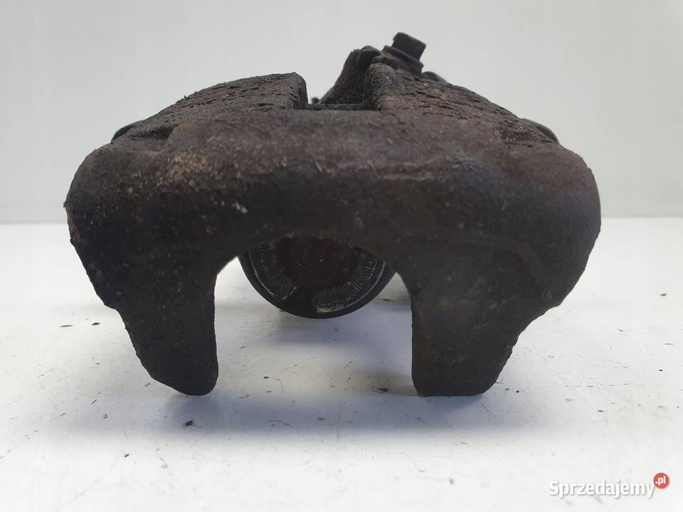 VW Tiguan TYLNY ZACISK HAMULCOWY lewy tył