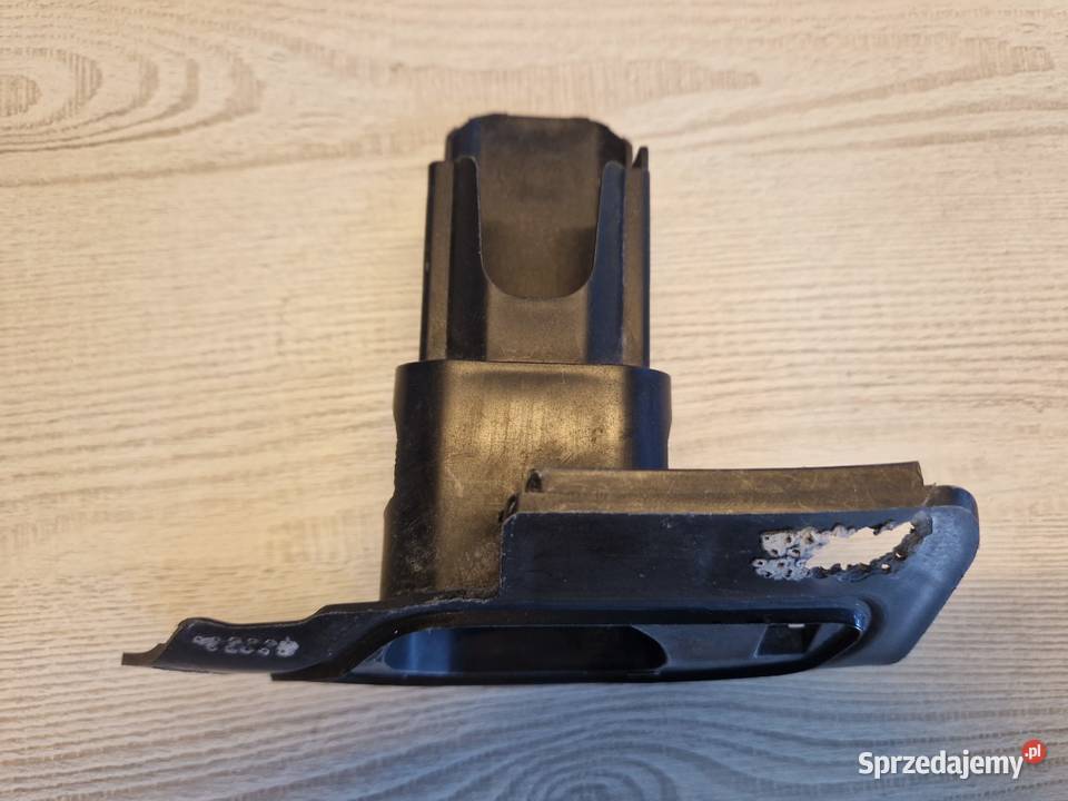 Mocowanie dyszy spryskiwacza reflektora WV Golf osobowe Kwilcz