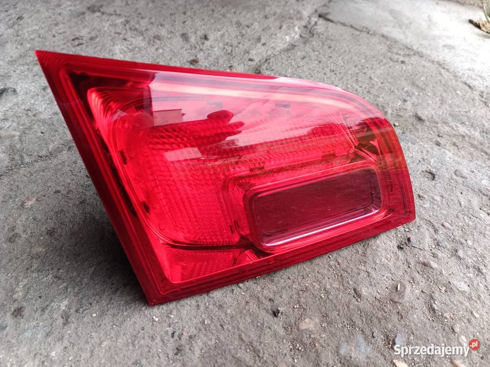 Lampa tylna lewa Opel Astra J kombi lewe Buszkowo
