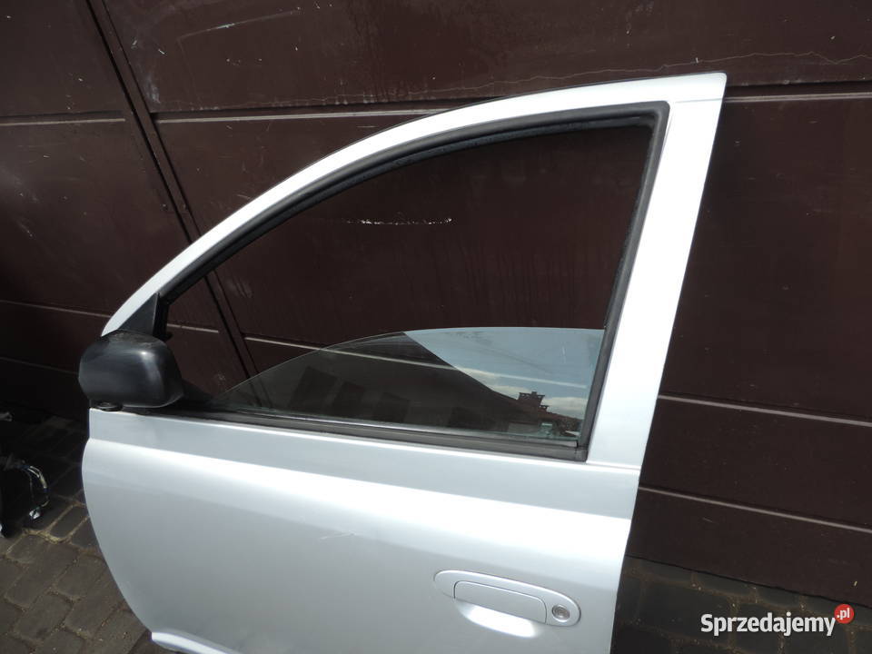DRZWI LEWY PRZÓD TOYOTA YARIS I HB FL 1E7 Nowy Sącz