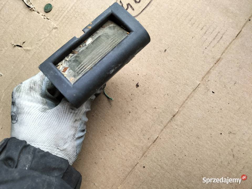 OPEL ASTRA F LAMPKA TABLICY REJESTRACYJNEJ Lampki tablicy rejestracyjnej Kamień-Kolonia