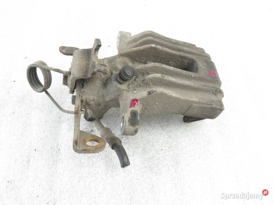 ZACISK LEWY TYŁ AUDI A4 B5 19 TDI