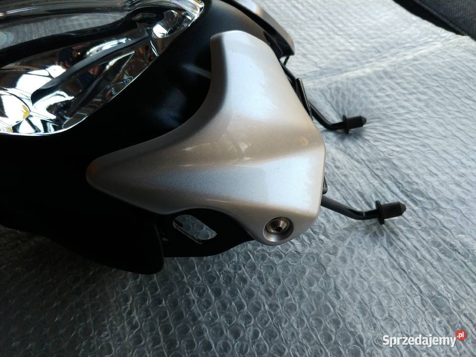 Lampa reflektor stelaż przód Suzuki SFV 650 Reflektory i halogeny