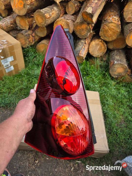 Lampa lewa lewy tył tylna Peugeot 107 1607990580 osobowe