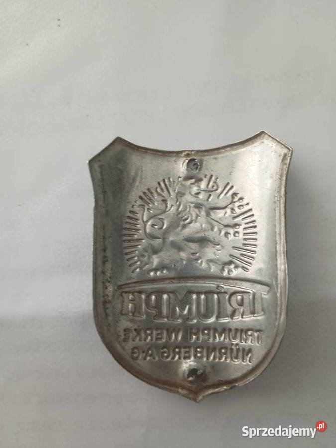 Blaszka z logo Triumph mazowieckie Garwolin