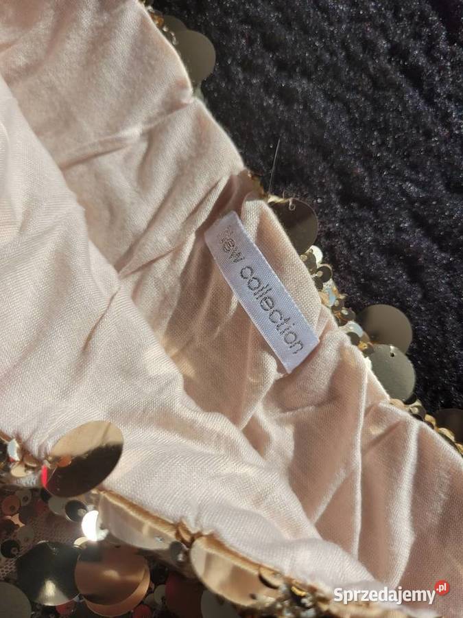 Złotą spódnica mini z dużymi cekinami Rozmiar uniwersalny sprzedam
