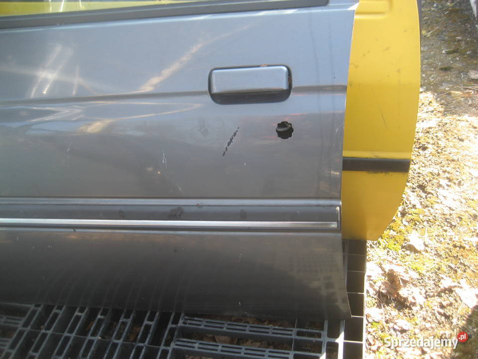 ford escort mk5 9092r drzwi przód lewe Rakoniewice