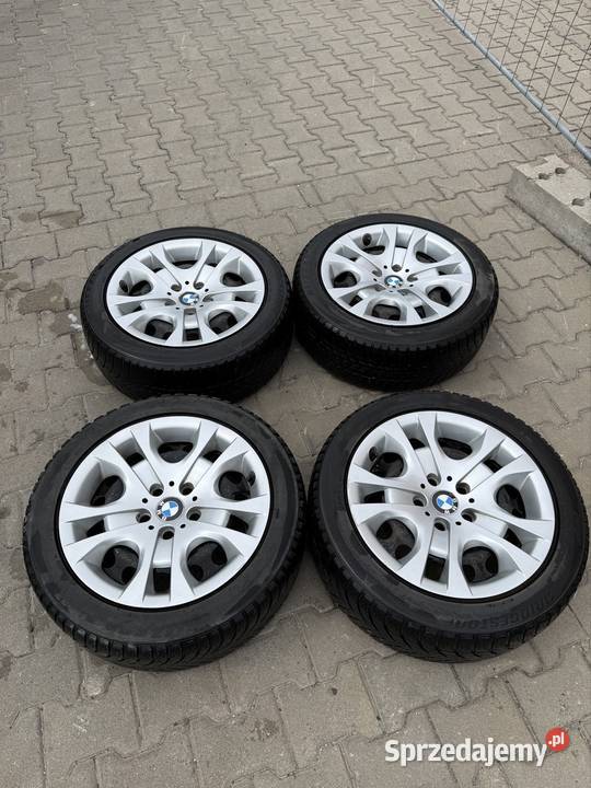 BMW X1 e84 koła felgi z orgynalnymi kołpakami Warszawa sprzedam