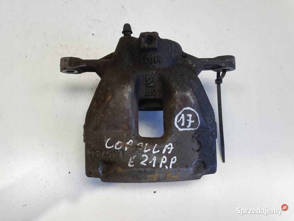 Toyota Corolla XII E21 PRZEDNI ZACISK HAMULCOWY Janów