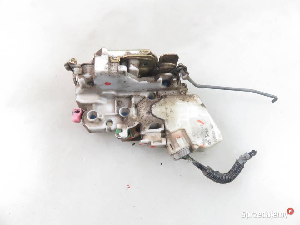 ZAMEK LEWY PRZEDNI NISSAN NAVARA D22 805525P013 sprzedam