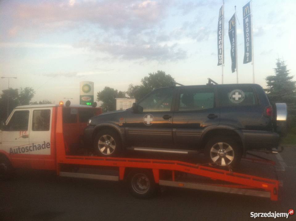 Pomoc drogowa laweta holowanie transport sam