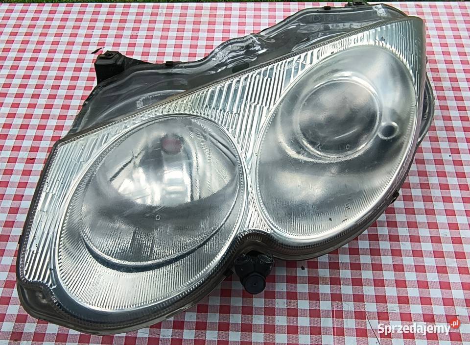 Chrysler 300m lampa lewy przód Motoryzacja