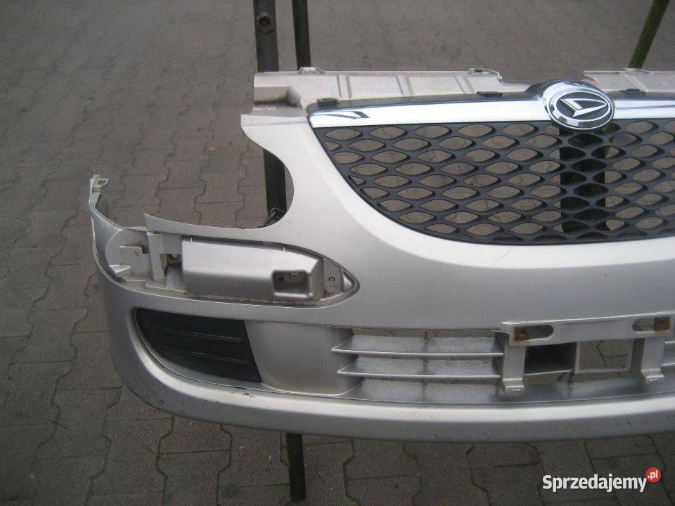 DAIHATSU SIRION 0205R ZDERZAK PRZEDNI KOD LAK Rakoniewice