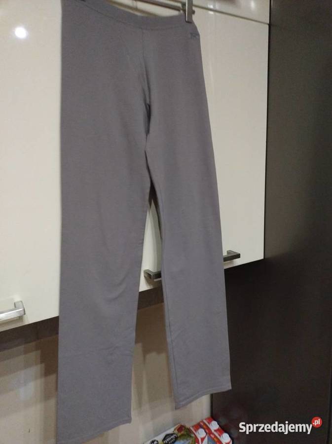 Spodnie dresowe w kolorze szarym REEBOK Inny materiał Lublin