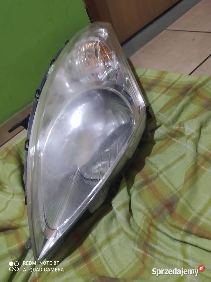 SUZUKI SWIFT 10 LAMPA LEWA PRZEDNIA P9121 EU H7 Międzychód