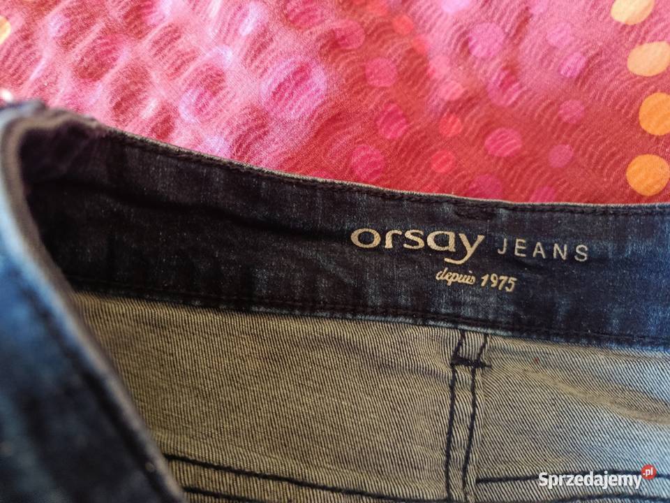 Damskie jeansy ze świecącymi paskami