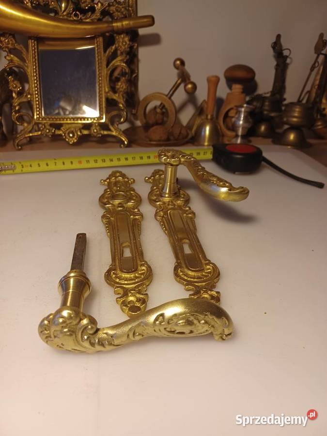 Komplet klamek i szyldów mosiężnych sprzedam