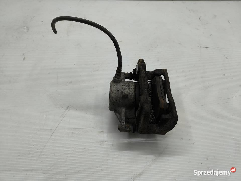 ZACISK LEWY PRZÓD MERCEDES EKLASA W212 22 CDI Zaciski i jarzma