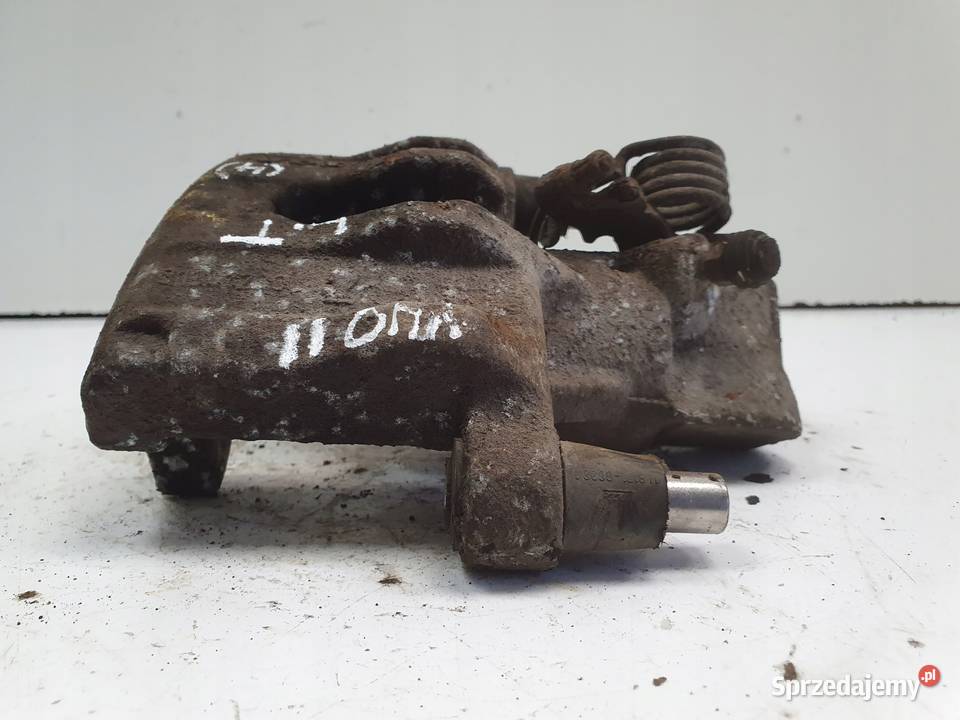 Volvo V40 II TYLNY ZACISK HAMULCOWY lewy tył Chełm