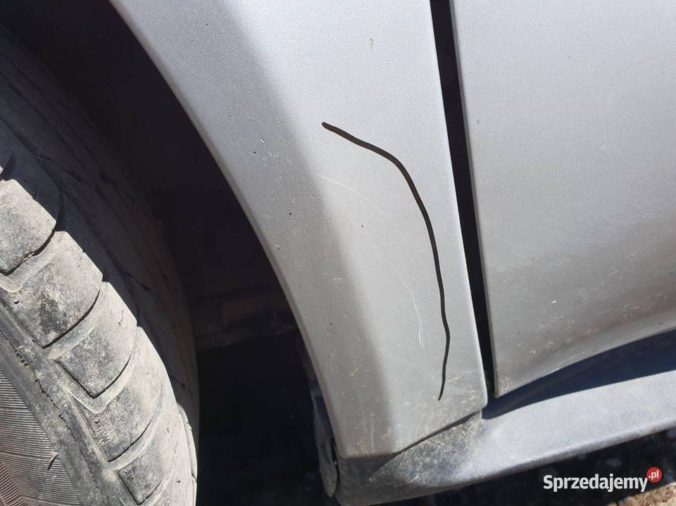 BŁOTNIK LEWY PRZÓD MERCEDES A KLASA W168 761 Lipno