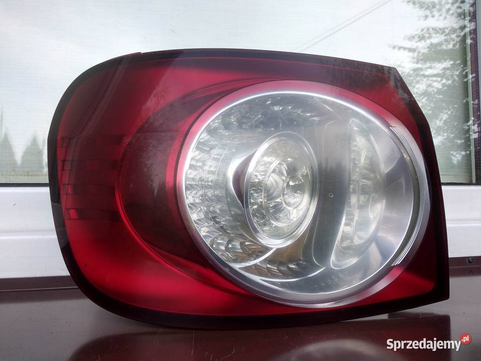 VW Golf V 5 Plus lampa tył tylna lewa oryginał osobowe Lampy tylne Sieradz