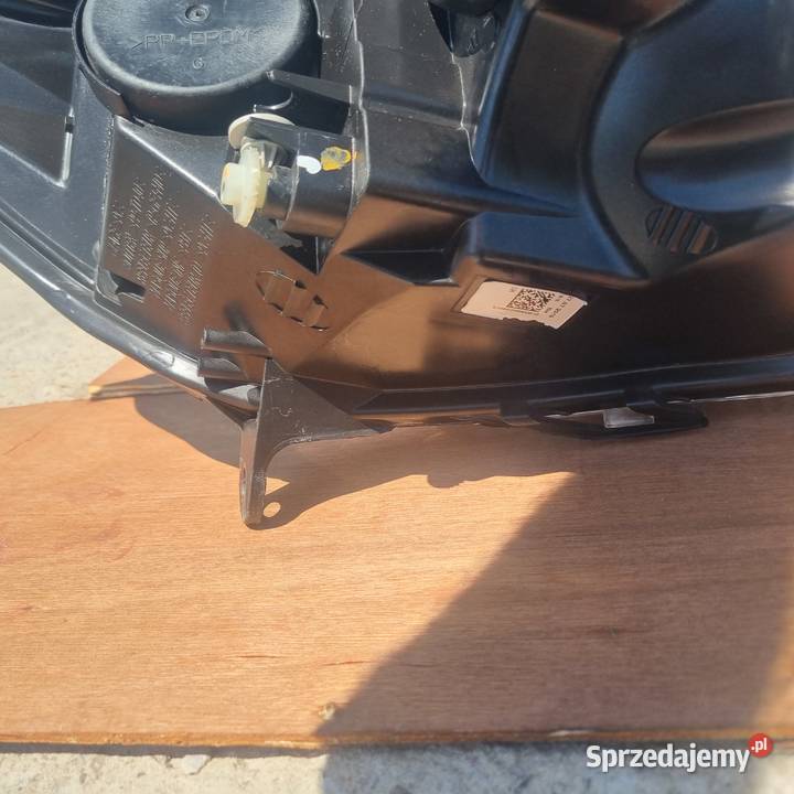 Lampa przednia lewa oryginalna OE Renault Clio