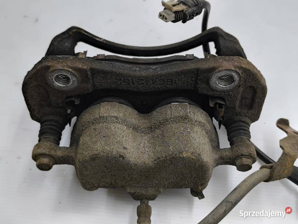 ZACISK LEWY PRZÓD OPEL ANTARA LIFT 22 CDTI Motoryzacja wielkopolskie