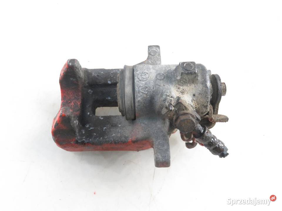 ZACISK LEWY TYŁ AUDI A4 B6 Zaciski i jarzma