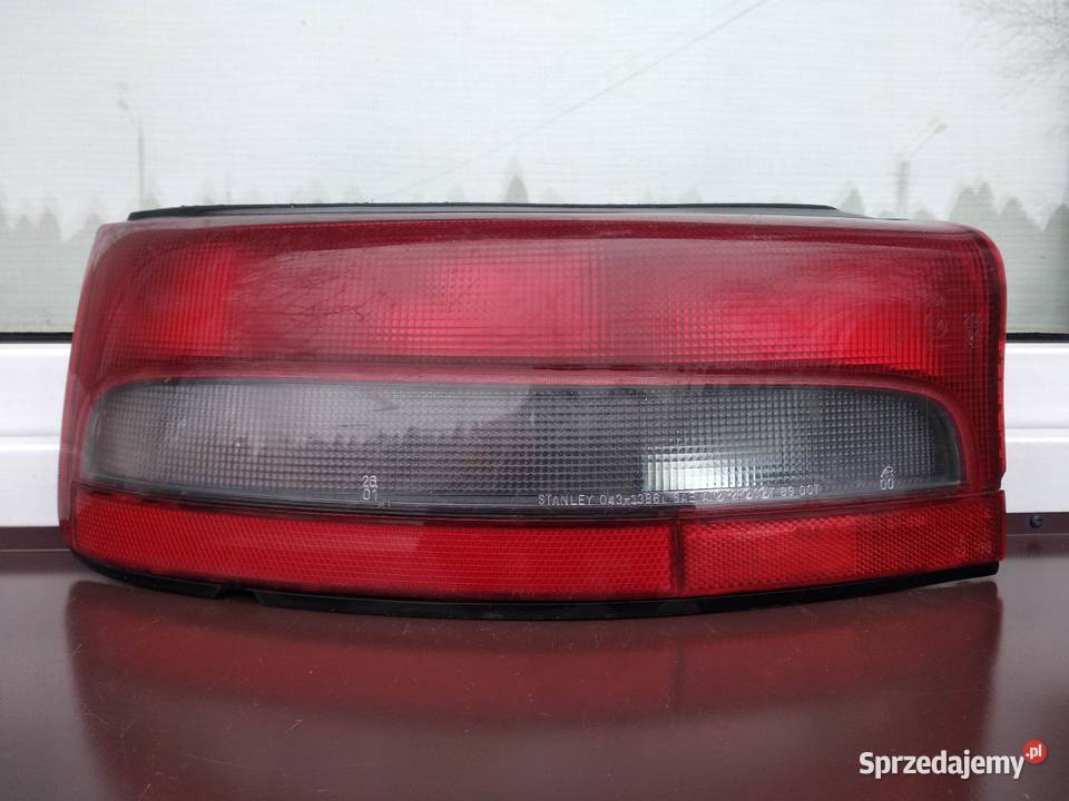 Mazda 323 BG hatchback HB lampa tył tylna lewa łódzkie