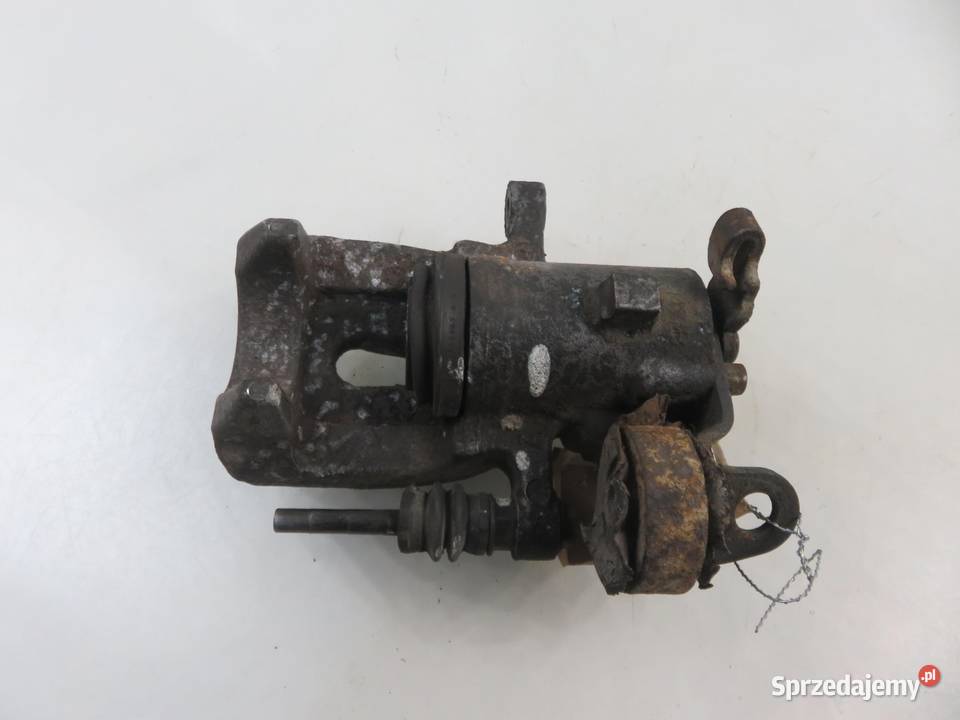 ZACISK LEWY TYŁ RENAULT GRAND SCENIC II osobowe małopolskie