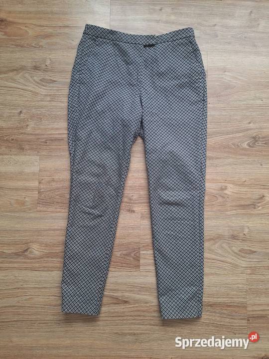 Świetne eleganckie spodnie Mohito z kieszeniami Kraków sprzedam