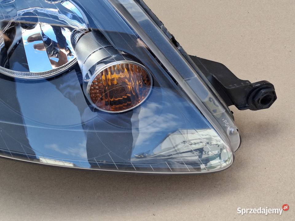 VW GOLF 5 V PLUS REFLEKTOR PRAWY LAMPA PRAWA osobowe Bieleń