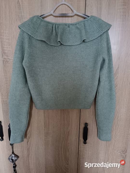 Rozpinany sweter z ozdobną falbanką w miętowym sprzedam