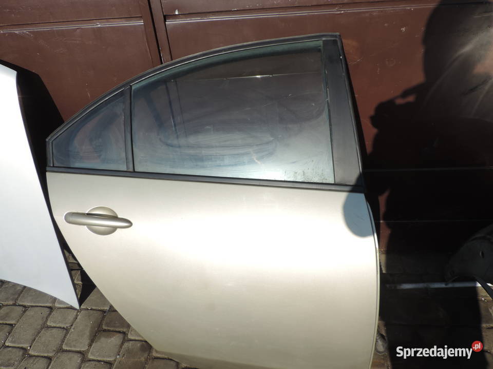 DRZWI PRZWY PRZÓD NISSAN PRIMERA P12 HB EY2Z
