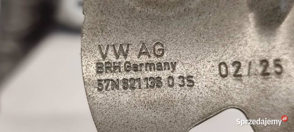 VW TAYRON MOCOWANIE BŁOTNIKA LEWE KOMPLET