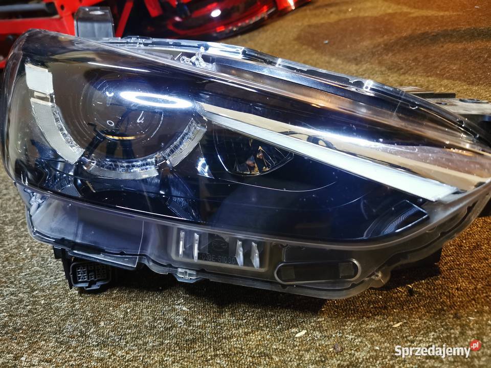 ORYGINALNA Lampa przednia Mazda CX3 OE D10E51030 Motoryzacja Pielgrzymka