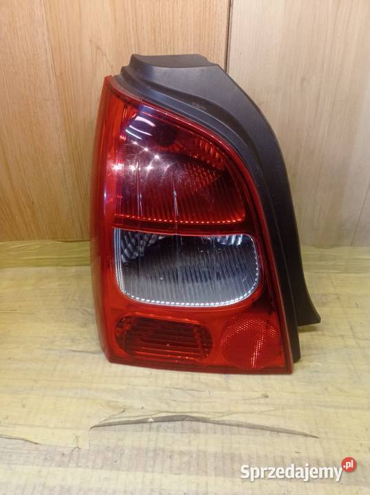 RENAULT TWINGO II LAMPA LEWA TYŁ TYLNA osobowe Oświetlenie Międzychód
