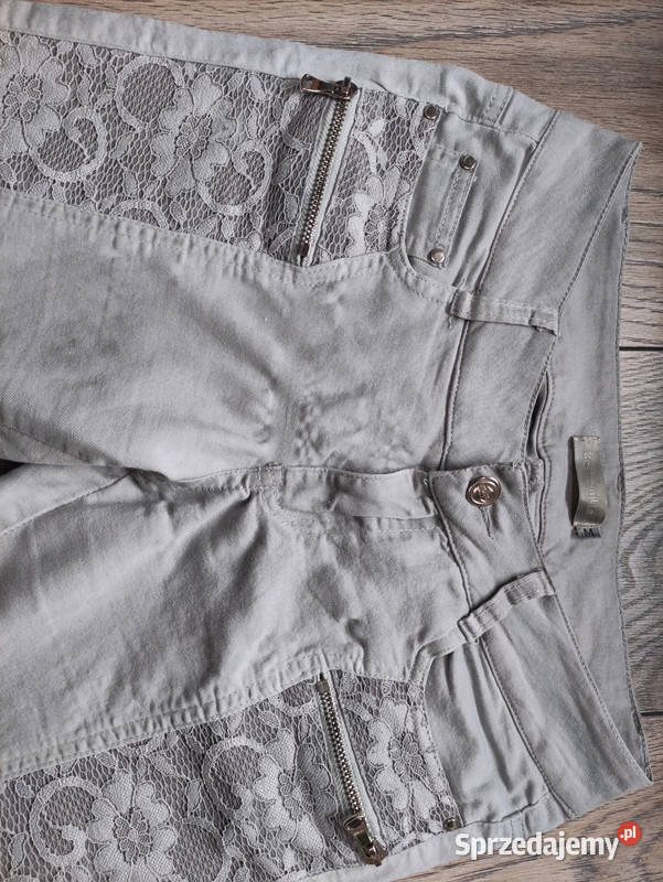 Jasne jeansy z koronkową wstawką r M Dąbrowica