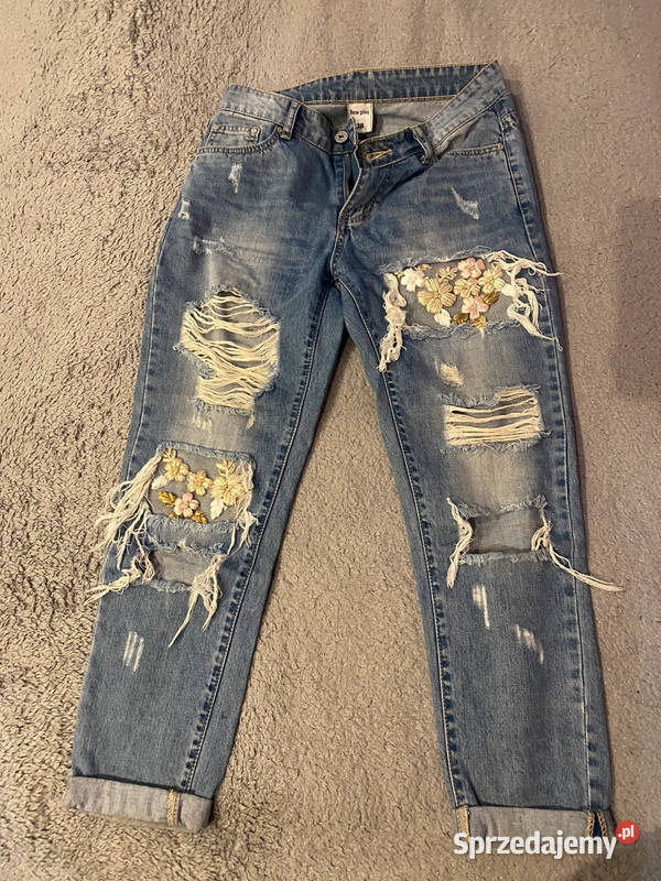 Dżinsyjeansy w rozmiarze 38M z dziurami i Warszawa