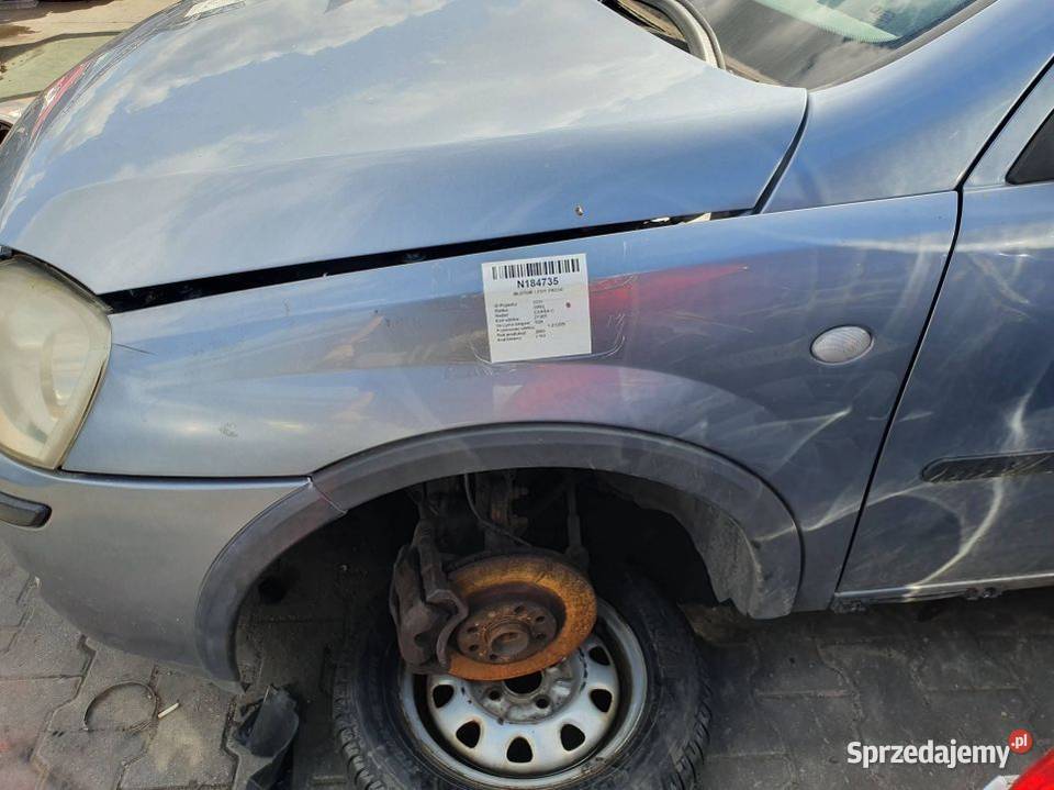 BŁOTNIK LEWY PRZÓD OPEL CORSA C L163 Lipno