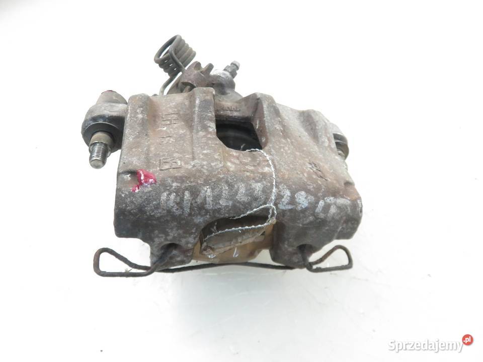 ZACISK LEWY TYŁ MAZDA 3 sedan BK 23 osobowe