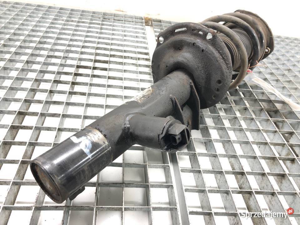 AMORTYZATOR LEWY PRZÓD ZE SPRĘŻYNĄ SKODA SUPERB