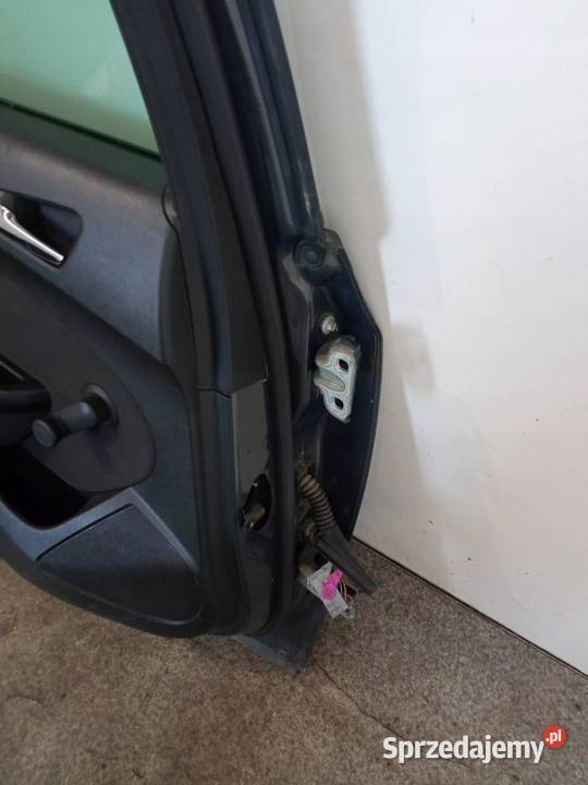 DRZWI LEWE TYŁ Z190 KOMBI Opel Astra IV 2009 J