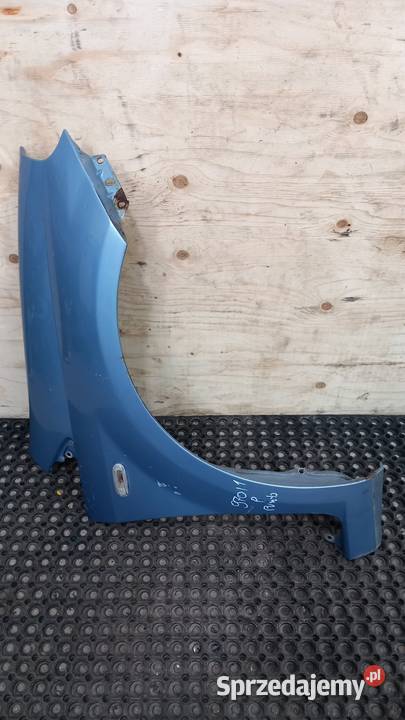FIAT GRANDE PUNTO EVO BŁOTNIK PRZÓD PRAWY 457B Zbierkowo