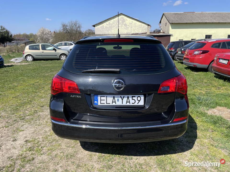 ŁADNA ASTRA J 14b 151000 światła do jazdy dziennej
