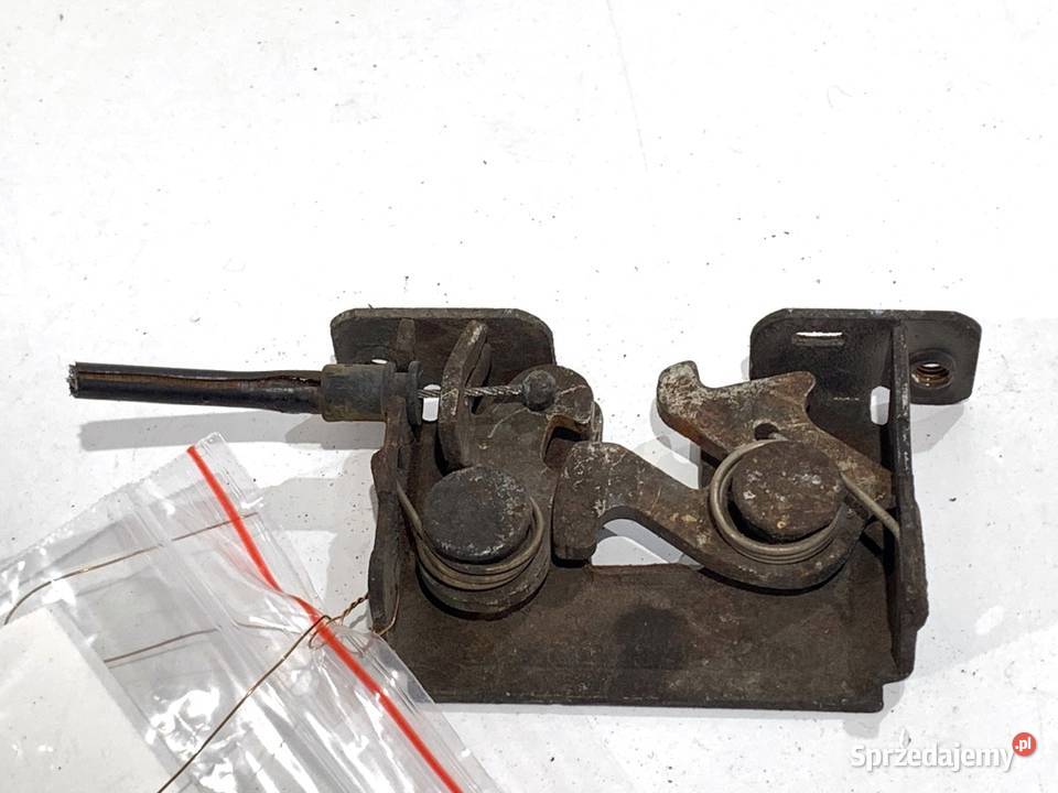 ZAMEK MASKI LEWY BMW E83 SUV 7115229 0311 osobowe