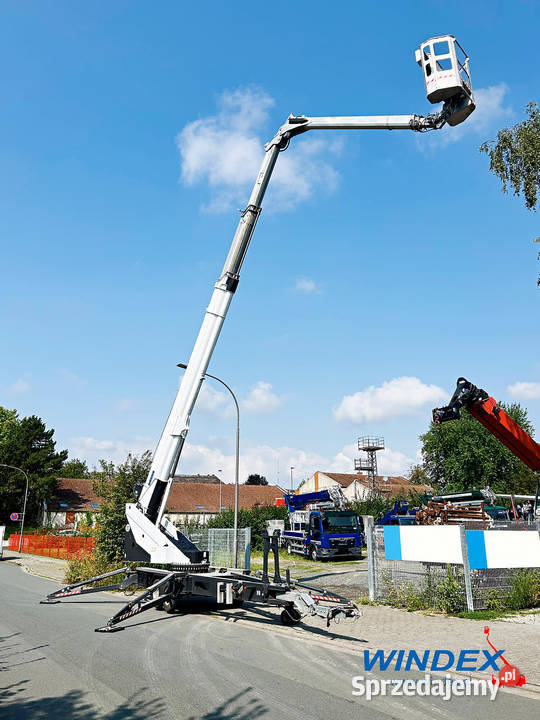 Żuraw ciesielskodekarski z koszem roboczym Bcker Chojnice